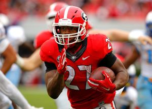 Running back Nick Chubb #27 of the Georgia Bulldogs rushes in for a touchdown in the third quarter of the game against the Southern University Jaguars. Many professional athletes are from Georgia.