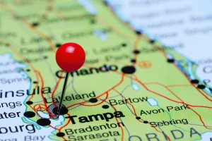 Photo of pinned Tampa, Florida on a map of USA. Tampa is a best city to start a business in 2024.
