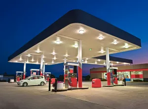 Horizontal shot of a gasoline station and convenience store. Best gas station food chains.