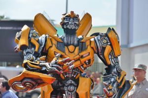 Bumblebee from Transformers. What did a man do after climbing a Bumblebee statue in New Mexico?
