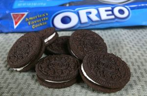 Oreo cookies laid out on a table in front of Oreo packaging. Oreo specials are very popular right now..