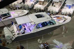 People visit Grady-White boats on display at a Michigan Boat Show.
