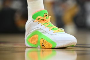 The shoes of Jayson Tatum #0 of the Boston Celtics are seen before Game Three. White and green NBA basketball sneakers