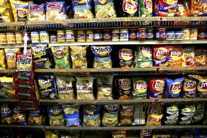 Chips on grocery store shelf. A robber stole money and Funyuns.
