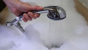 Bathtub filled with water. Is throwing ice cubes at your bathtub a new anger management hack?