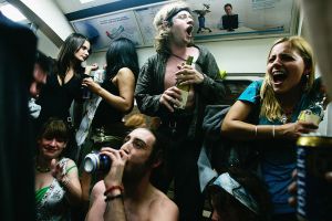 People drinking on a train. What are the most popular drinking songs in rock?