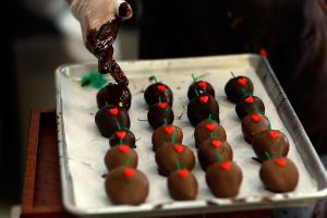 Chocolate covered strawberries. Strawberries are on the list of foods to put you in the mood.