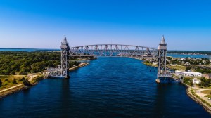 An aerial view of the Bourne Bridge in MA on a sunny day over the canal. Flights to Cape Cod could decrease bridge traffic.
