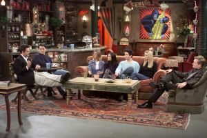 Cast members of NBC's comedy series "Friends on the FRIENDS experience couch.