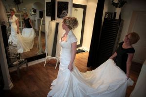 A bride in her wedding dress. Bride accidentally moons guests at her wedding