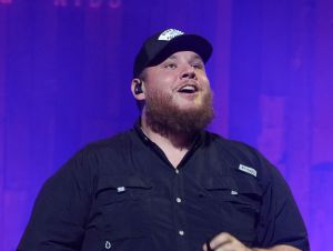 Luke Combs's New Song From The 2024 Twisters Movie - Luke n stage in black.