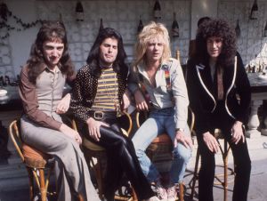 British rock group Queen at Les Ambassadeurs, where they were presented with silver, gold and platinum discs for sales in excess of one million of their hit single 'Bohemian Rhapsody'.