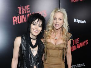 Musicians Joan Jett (L) and Cherie Currie arrive at the premiere of Apparition's "The Runaways" held at ArcLight Cinemas Cinerama Dome on March 11, 2010 in Los Angeles, California.