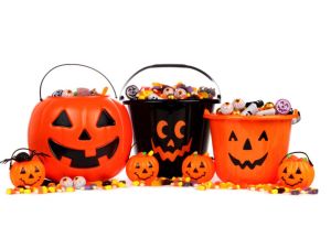Group of assorted Halloween Jack o Lantern candy collectors isolated on a white background