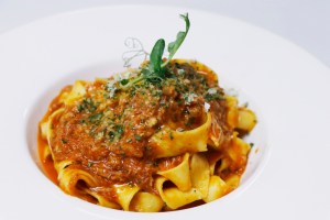 italian pasta with minced beef ragu known as bolognese sauce in serving plate best pasta on cape cod