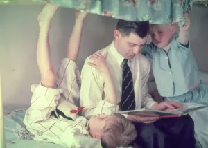 Dad reading a bedtime story to his kids. What are the greatest songs about being a dad of all-time?