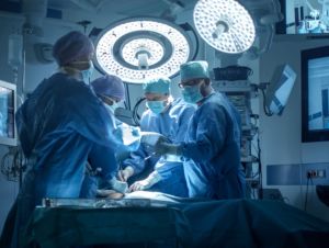 Medical Team Performing Surgical Operation in Modern Operating Room