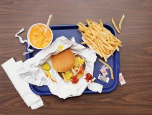 Elevated View of a Tray With Fries, a Hamburger and Lemonade, fast-food concept.